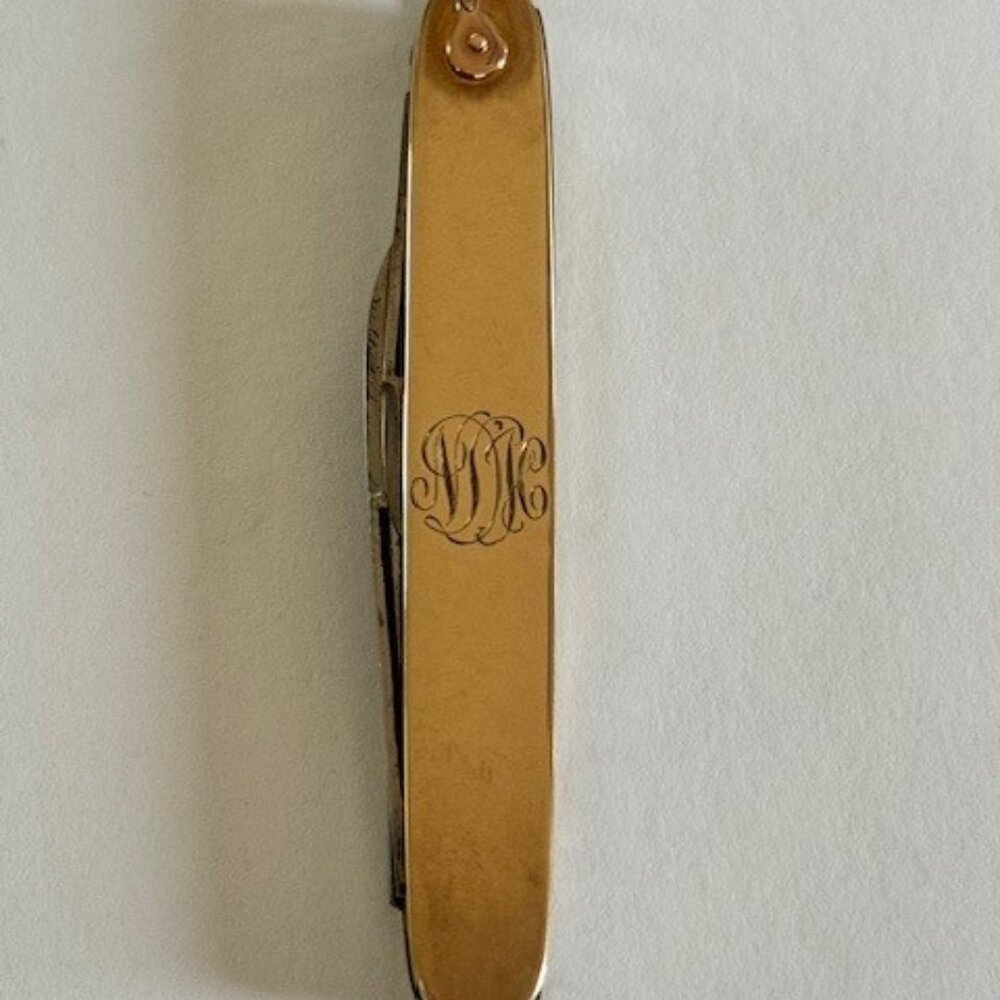 10kt gold pocket knife pendant